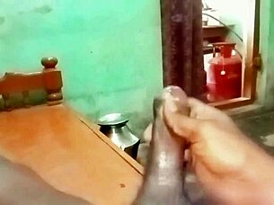 indian aunty gives handjob to young guy at home