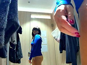 masturbating while trying clothes in public room