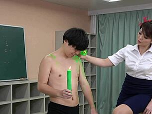 female teacher plays with student using wax