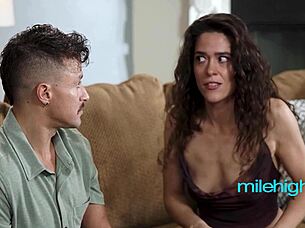 curly haired latina rides reverse cowgirl on the sofa