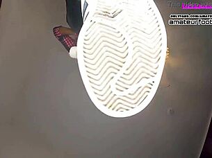 gigantic girl shoeplay dipping dangling shows her stinky