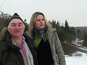 Young blonde fucks older man outdoors in snow