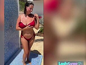 wet brunette milf lady lyne fingers herself under outdoor shower