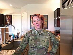 Military woman trains young man in bedroom