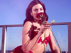 Greek milf babe xris kovtos posing nude on a balcony