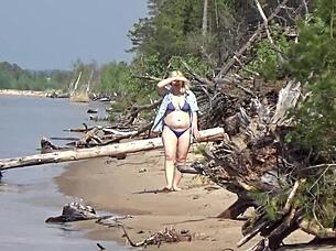 wild beach walk shows milfs in bikinis