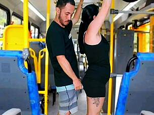Brunette gets touched while riding the public bus