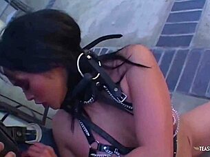 bad biker girl locked in cage for play