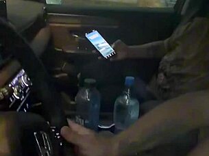 She sucks and plays while driving through the city