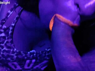 couplesdelight sexy misses e sucks cock in uv light