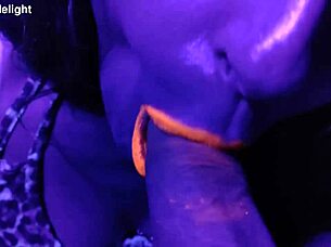 couplesdelight sexy misses e sucks cock in uv light