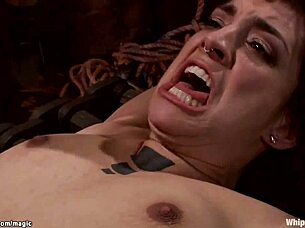 Bound dyke whipped and ass fucked hard