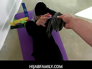 athlete in hijab rides coach