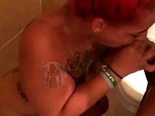 slutty girl on her knees sucks a big black cock