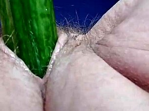 granny fucks hairy pussy with cucumber