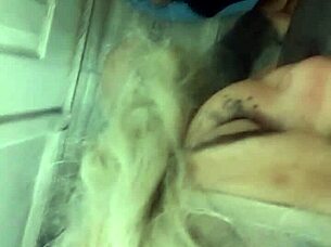 Young woman takes large black man deeply