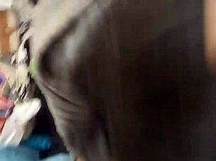 Young woman takes large black man deeply