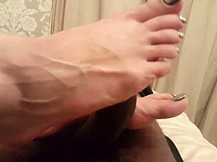 Miss K gives an amazing footjob that drives me wild