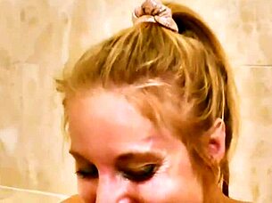 Watch this blonde milf play nude in the bathtub, showing her pussy and ass.