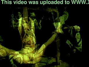 Justine Endures BDSM Spanking and Tit Play in the Torture Chamber Trailer.