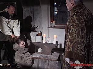 Justine Endures BDSM Spanking and Tit Play in the Torture Chamber Trailer.