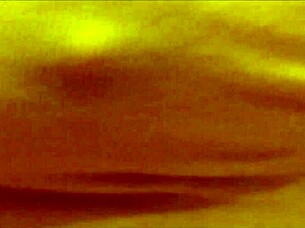 Shemale performs self-urination act.