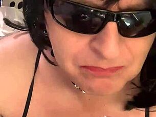 Cd Nikki feels aroused smoking and playing with fake cum