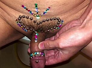 Vajazzling design with silver heart close up