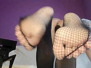 feet in fishnets look so sexy