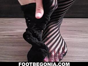 Pretty toes in black stockings for foot fetish close-up