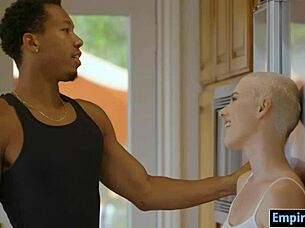 Blonde pornstar Riley Nixon sucks and kisses massive black cock before getting pounded hard