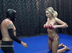 Hey, check out Karina King dominating that black grappler in a quick match! 💪😏