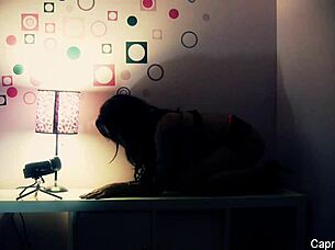 Capri Cavanni and Dahlia Sky engage in a private session of self-pleasure.