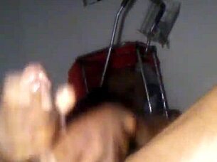 i'm oiled up stroking my long black cock to cumshot