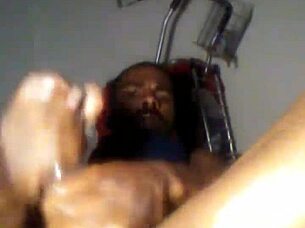 i'm oiled up stroking my long black cock to cumshot