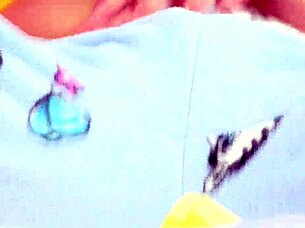 Demi A plays with her blue dildo toy