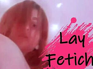 Does this redhead tease with feet fetish?