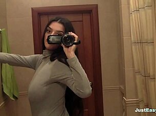 Busty Babe FINGERS Her Bush In Bathroom