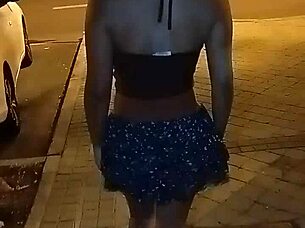 Sofia teases with pussy flash on public street