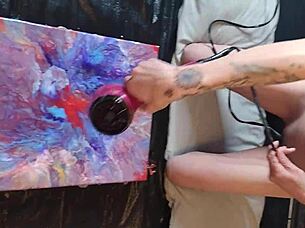 Naked painting session continues with artistic focus