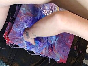 Naked painting session continues with artistic focus