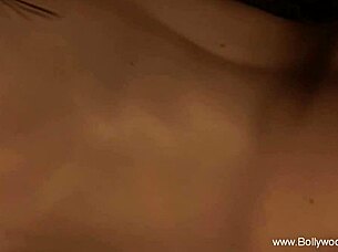 a sensual brunette from bollywood dances nude, teasing with erotic softcore moves in an asian-inspired scene.