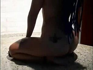 Purple-haired beauty dances on the desk