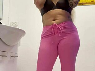 Watch this blonde teen rip her clothes off in a provocative striptease?