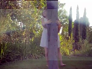 Two women share intimate moments outdoors