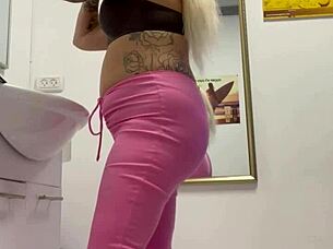 Watch this blonde teen rip her clothes off in a provocative striptease?