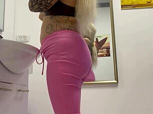 Watch this blonde teen rip her clothes off in a provocative striptease?