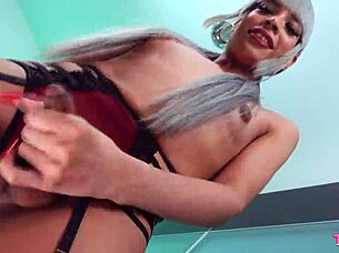 Itzel the Asian tgirl masturbates in lingerie and stockings