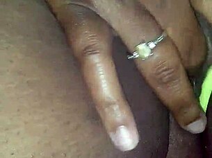 my pretty ebony wife fingers her wet shaved pussy