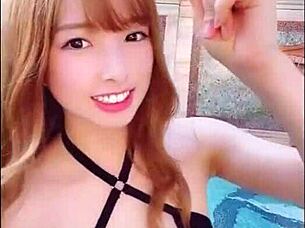 I can't stop starin at this japanese girls big boobs while she dances on the beach